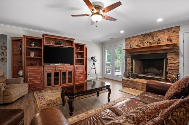 204 Chapman Ct, La Fayette, GA 30728 - living area featuring ornamental molding, a ceiling fan, a fireplace, wood finished floors, and recessed lighting