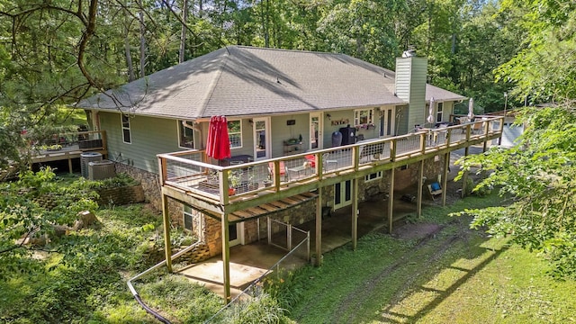 204 Chapman Ct, La Fayette, GA 30728 - rear view of property with a chimney, roof with shingles, and a wooden deck