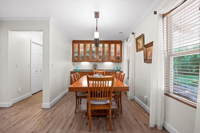 204 Chapman Ct, La Fayette, GA 30728 - dining room with baseboards, ornamental molding, and light wood-style floors