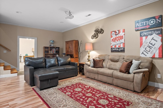 204 Chapman Ct, La Fayette, GA 30728 - living area featuring stairs, light wood-style floors, ornamental molding, and baseboards