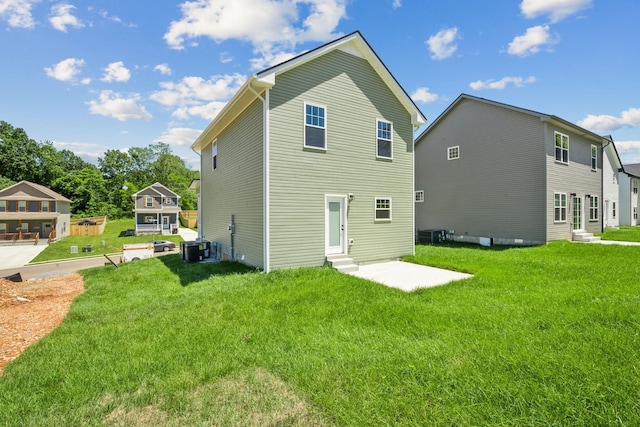 1441 Isaiah Dr, Clarksville, TN 37042 - back of property with entry steps, a yard, and cooling unit