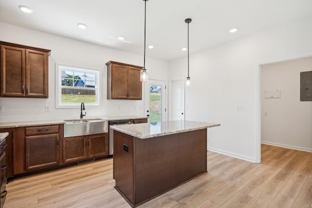 1441 Isaiah Dr, Clarksville, TN 37042 - kitchen featuring a sink, stainless steel dishwasher, light wood-style flooring, healthy amount of natural light, and recessed lighting