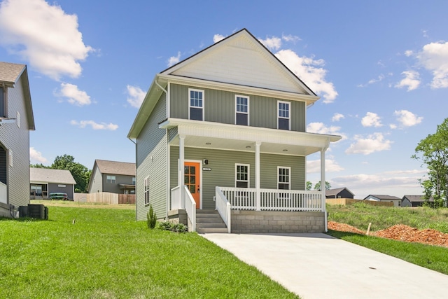 1441 Isaiah Dr, Clarksville, TN 37042 - view of front of property with a porch, board and batten siding, a front yard, and cooling unit