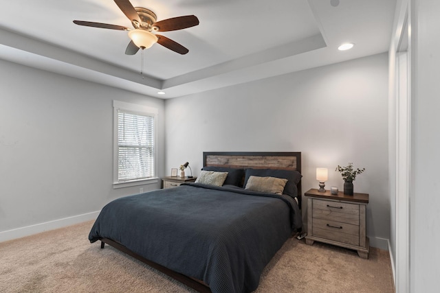 3024 Trice Pl, Lebanon, TN 37087 - bedroom with light colored carpet, baseboards, recessed lighting, a tray ceiling, and a ceiling fan