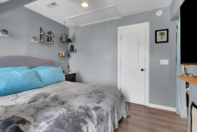 681 Crescent Rd, Murfreesboro, TN 37128 - bedroom with attic access, wood finished floors, and baseboards