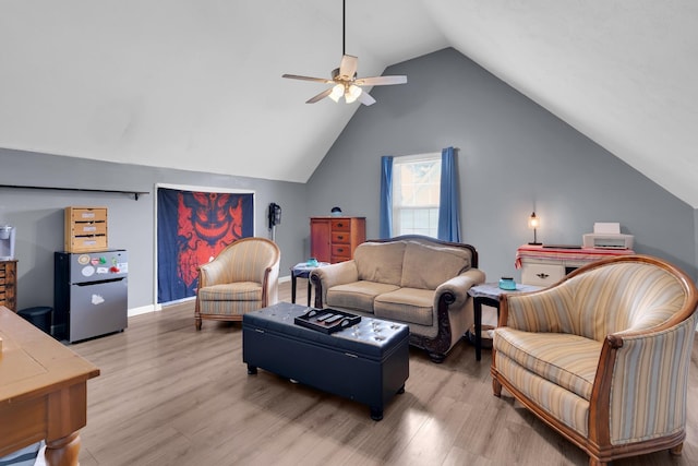 681 Crescent Rd, Murfreesboro, TN 37128 - living area featuring light wood-style flooring, vaulted ceiling, a ceiling fan, and baseboards