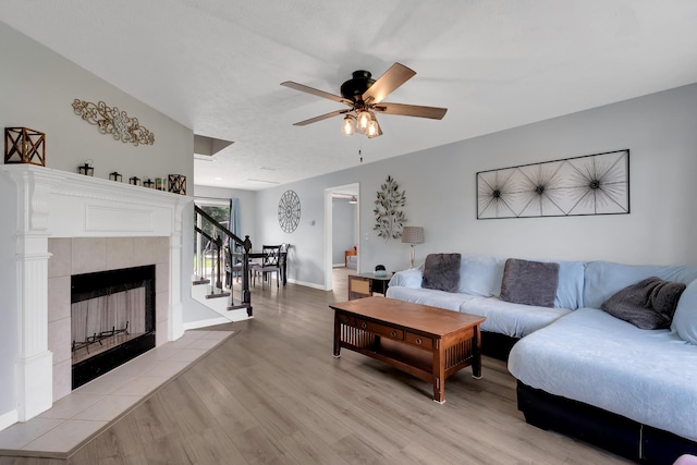 681 Crescent Rd, Murfreesboro, TN 37128 - living room with ceiling fan, light wood-style flooring, stairs, and baseboards