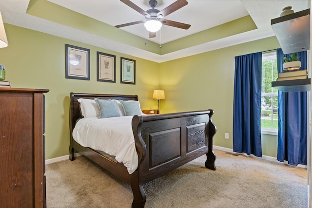 736 Verona Ave, Lewisburg, TN 37091 - bedroom featuring a raised ceiling, baseboards, carpet flooring, and a ceiling fan