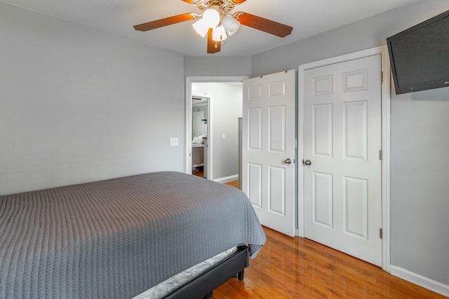 177 Oak Meadow Dr, Rock Spring, GA 30739 - bedroom with wood finished floors, ceiling fan, and baseboards