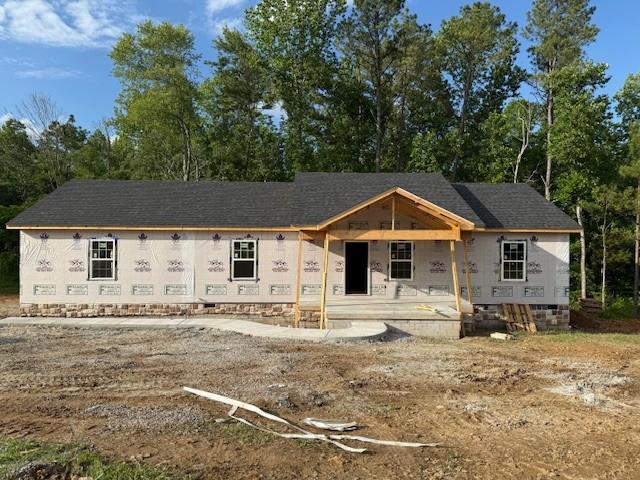 4178 Riley Creek Rd, Normandy, TN 37360 - property under construction with a porch and view of scattered trees
