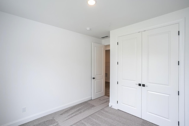 2370 Williamsport Lndg, Columbia, TN 38401 - unfurnished bedroom with light colored carpet, baseboards, and a closet