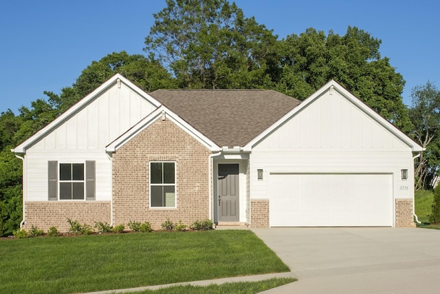 2370 Williamsport Lndg, Columbia, TN 38401 - view of front of home with brick siding, board and batten siding, and a garage