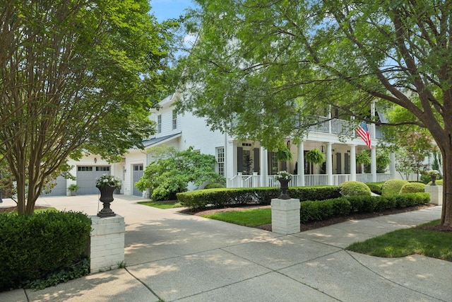 1616 Championship Blvd, Franklin, TN 37064 - view of property hidden behind natural elements featuring a porch and a garage