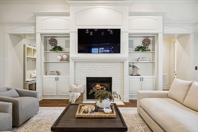 1616 Championship Blvd, Franklin, TN 37064 - living room featuring dark wood-style floors, a fireplace, and built in features