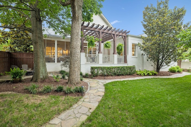 1616 Championship Blvd, Franklin, TN 37064 - view of front facade with a pergola, a sunroom, ceiling fan, and brick siding