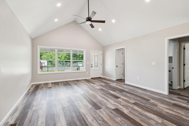 304 S Maple St, Hohenwald, TN 38462 - unfurnished living room with a ceiling fan, high vaulted ceiling, baseboards, wood finished floors, and recessed lighting