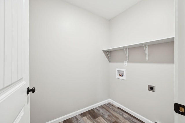 304 S Maple St, Hohenwald, TN 38462 - washroom featuring hookup for an electric dryer, hookup for a washing machine, baseboards, and dark wood-style floors