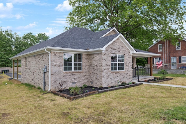 304 S Maple St, Hohenwald, TN 38462 - view of front of property featuring crawl space, a shingled roof, and brick siding