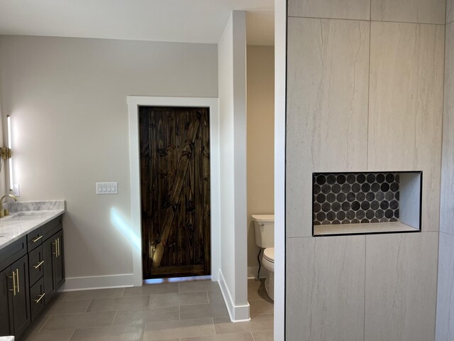 281 Bluebell Dr, Clarksville, TN 37043 - full bathroom featuring tile patterned flooring, toilet, vanity, and baseboards