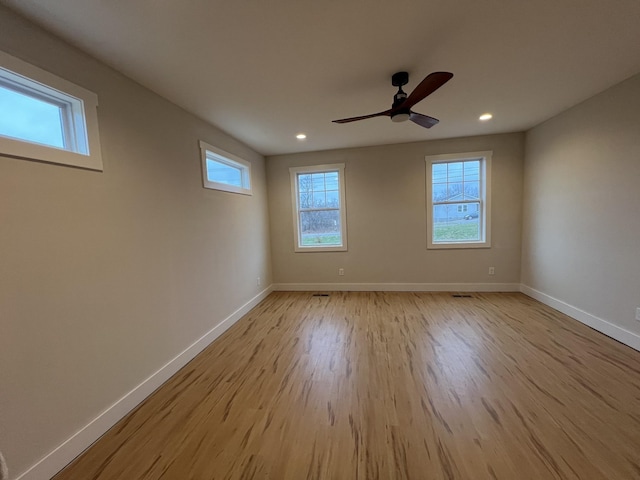 281 Bluebell Dr, Clarksville, TN 37043 - empty room with plenty of natural light, baseboards, wood finished floors, a ceiling fan, and recessed lighting