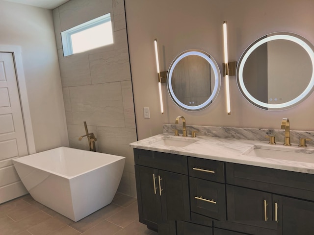 281 Bluebell Dr, Clarksville, TN 37043 - full bathroom with double vanity and a freestanding tub