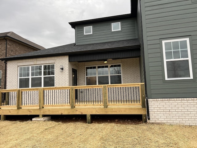281 Bluebell Dr, Clarksville, TN 37043 - rear view of property with brick siding, roof with shingles, and a deck