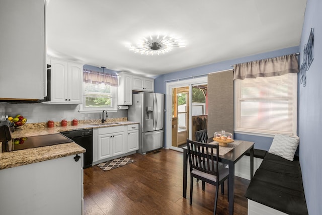 708 Tumbleweed Trl, Mount Juliet, TN 37122 - kitchen with stainless steel fridge with ice dispenser, a sink, black dishwasher, and healthy amount of natural light