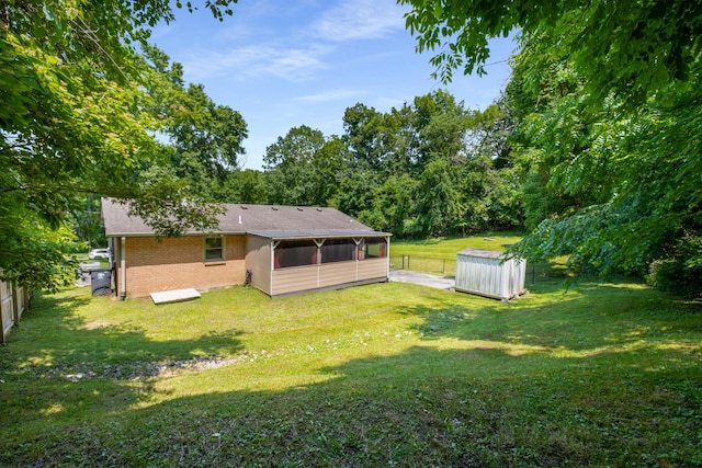 708 Tumbleweed Trl, Mount Juliet, TN 37122 - rear view of property with a sunroom and brick siding
