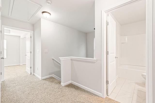 913 Battleview Pl, Murfreesboro, TN 37128 - hall with attic access, an upstairs landing, marble finish flooring, and baseboards