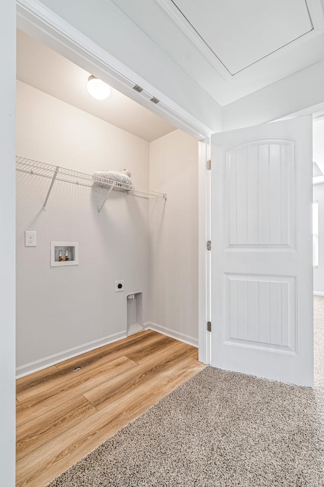 913 Battleview Pl, Murfreesboro, TN 37128 - laundry room featuring hookup for a washing machine, electric dryer hookup, baseboards, and wood finished floors