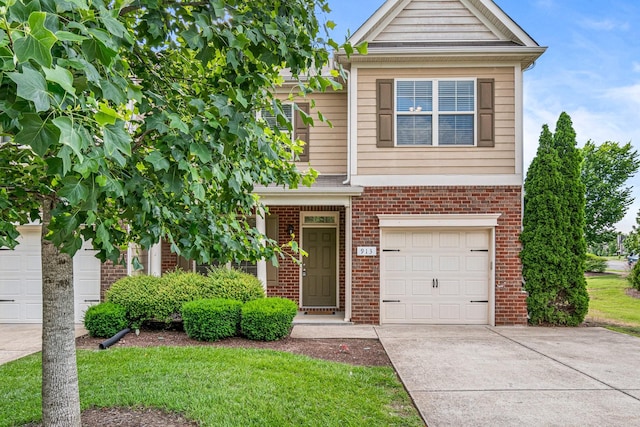 913 Battleview Pl, Murfreesboro, TN 37128 - view of front of house with concrete driveway, brick siding, and an attached garage