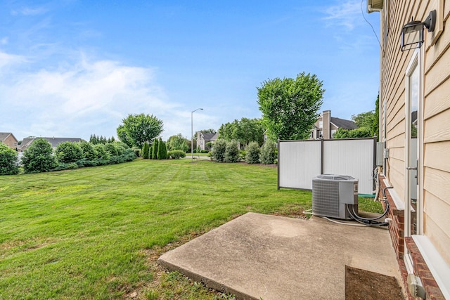 913 Battleview Pl, Murfreesboro, TN 37128 - view of grassy yard featuring central AC and a patio