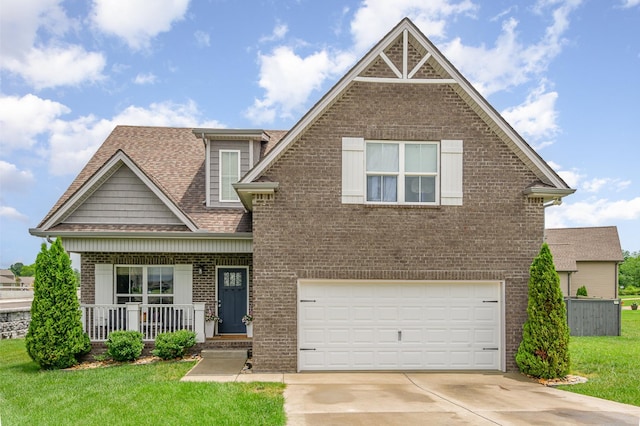 201 Hart Ln, Lebanon, TN 37087 - view of front facade featuring a porch, brick siding, a front yard, concrete driveway, and a garage