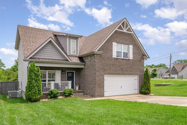 201 Hart Ln, Lebanon, TN 37087 - view of front facade with covered porch, an attached garage, a shingled roof, concrete driveway, and brick siding