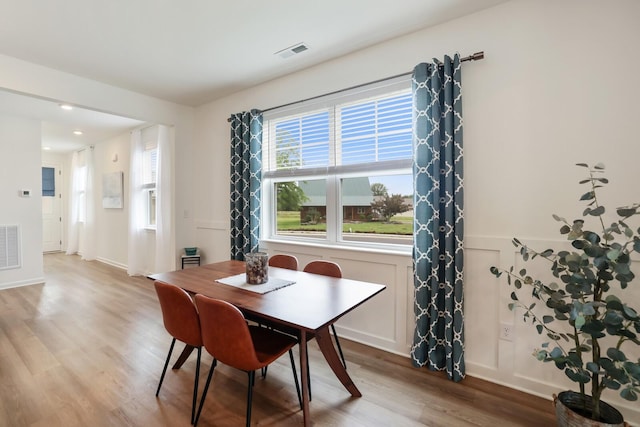 425 Multrees Pl, Smyrna, TN 37167 - dining room with wood finished floors and a decorative wall