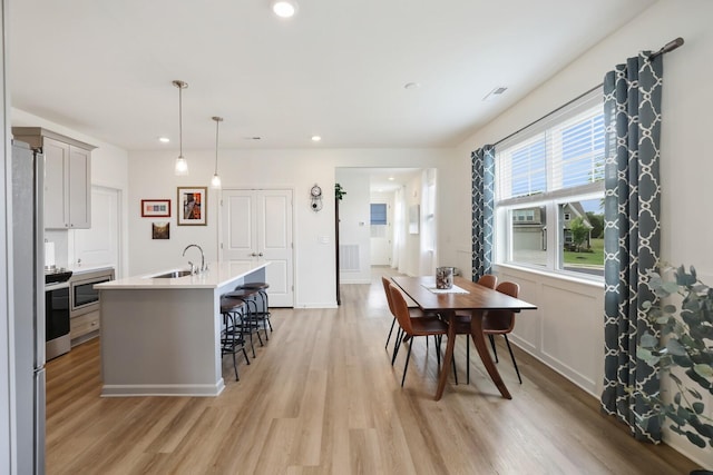 425 Multrees Pl, Smyrna, TN 37167 - dining room with light wood-style flooring, recessed lighting, and baseboards