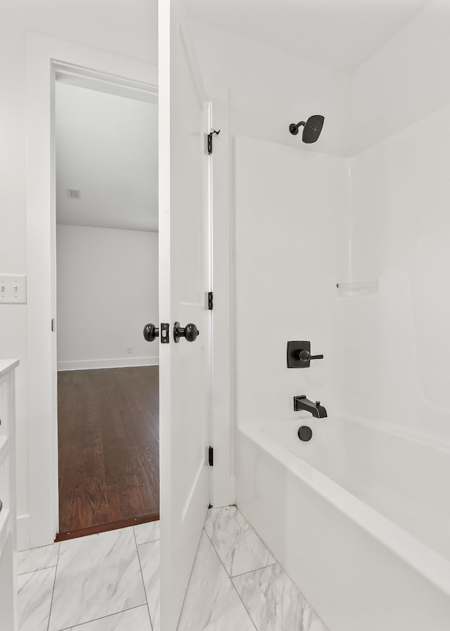1508 Barnes Dr, Cookeville, TN 38501 - full bath featuring  shower combination, marble look tile flooring, and baseboards