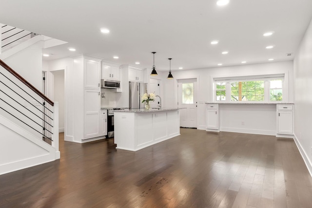 1508 Barnes Dr, Cookeville, TN 38501 - kitchen featuring stainless steel appliances, white cabinetry, recessed lighting, light stone countertops, and dark wood-type flooring