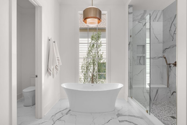 609 Bowling Ave, Nashville, TN 37215 - bathroom with a freestanding bath, marble tiled floors, toilet, a marble finish shower, and baseboards