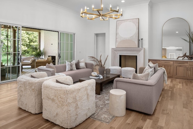 609 Bowling Ave, Nashville, TN 37215 - living area featuring a chandelier, crown molding, light wood finished floors, and recessed lighting