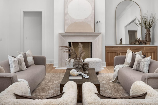 609 Bowling Ave, Nashville, TN 37215 - living area featuring light wood-style flooring, a premium fireplace, and baseboards