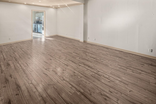2113 River Chase Dr, Murfreesboro, TN 37128 - empty room with wood finished floors, baseboards, and recessed lighting