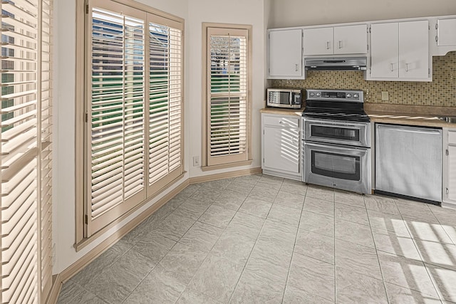 2113 River Chase Dr, Murfreesboro, TN 37128 - kitchen featuring stainless steel appliances, backsplash, under cabinet range hood, and white cabinets