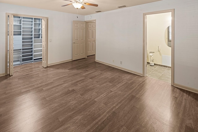 2113 River Chase Dr, Murfreesboro, TN 37128 - unfurnished bedroom with wood finished floors, baseboards, ceiling fan, and ensuite bath