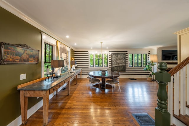 1702 Stokes Ln, Nashville, TN 37215 - dining space featuring crown molding, wood finished floors, and recessed lighting