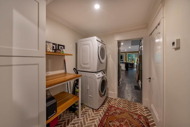 1702 Stokes Ln, Nashville, TN 37215 - washroom with stacked washing machine and dryer, brick flooring, recessed lighting, and ornamental molding