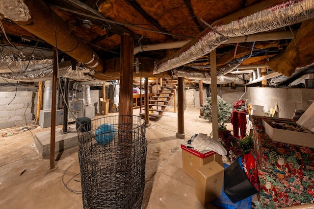 1702 Stokes Ln, Nashville, TN 37215 - unfinished basement featuring gas water heater, stairs, and heating unit
