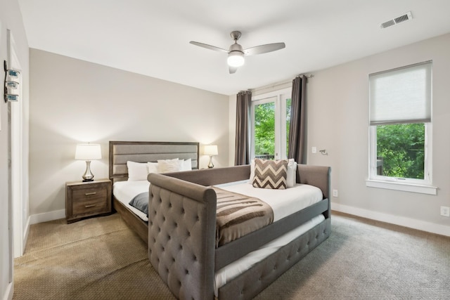 64 Fern Ave Unit 3, Nashville, TN 37207 - bedroom featuring light colored carpet, baseboards, and a ceiling fan
