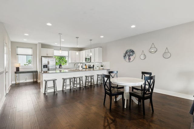 64 Fern Ave Unit 3, Nashville, TN 37207 - dining room featuring recessed lighting, dark wood-style floors, and baseboards