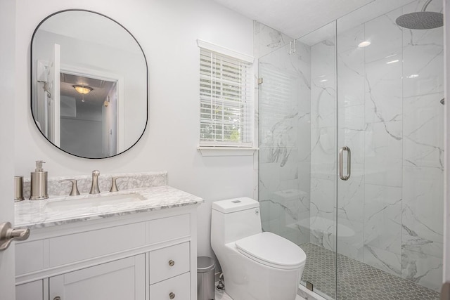 1077 Kathryn Rd, Mount Juliet, TN 37122 - bathroom featuring a marble finish shower, toilet, and vanity